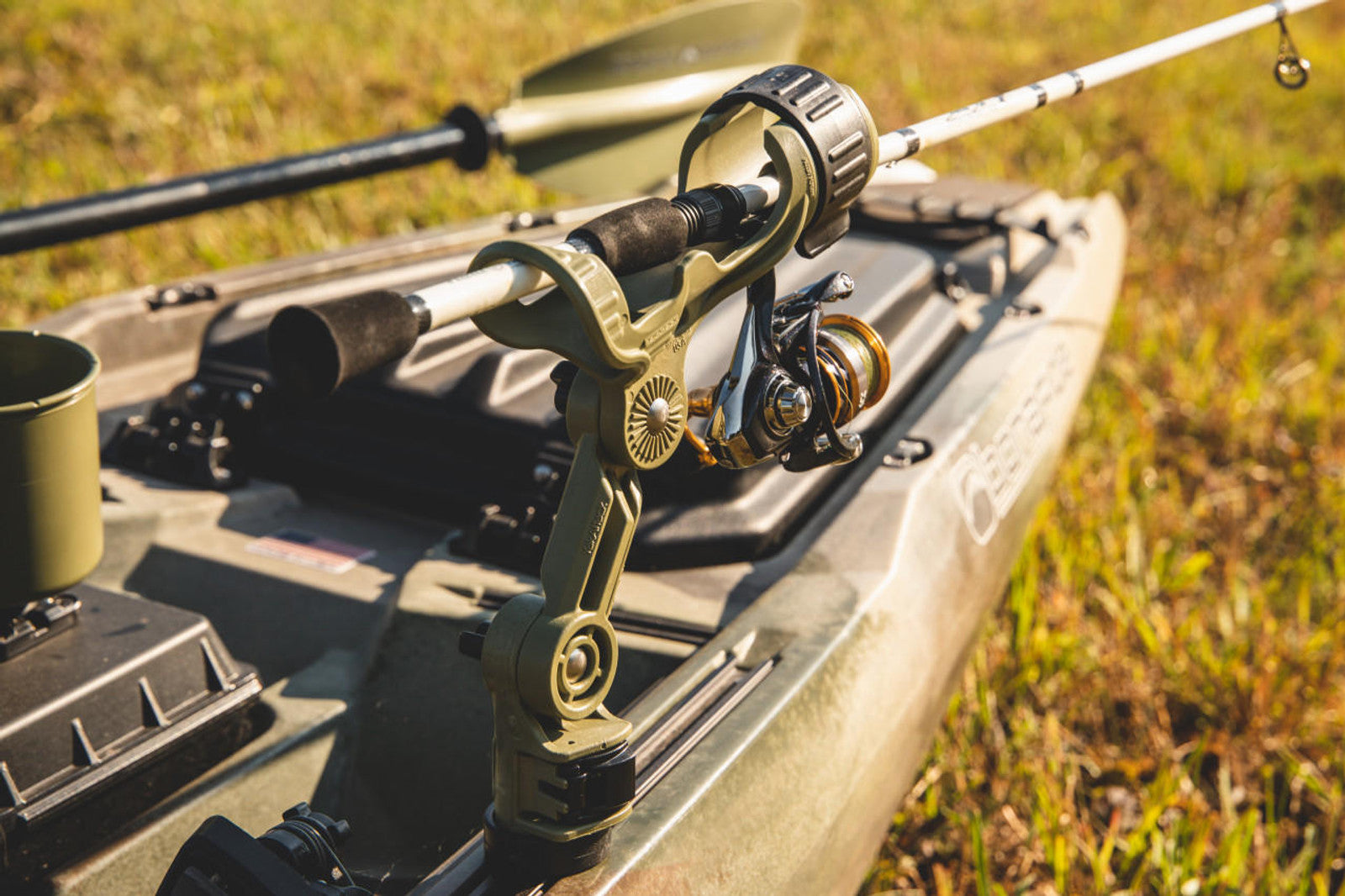 Omega Pro™ Rod Holder with Track Mounted LockNLoad™ Mounting System, Olive Green.